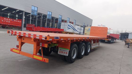 Venda direta Semi-remolque de cama plana personalizado 2/3 eixo 20FT 40FT Container diretamente